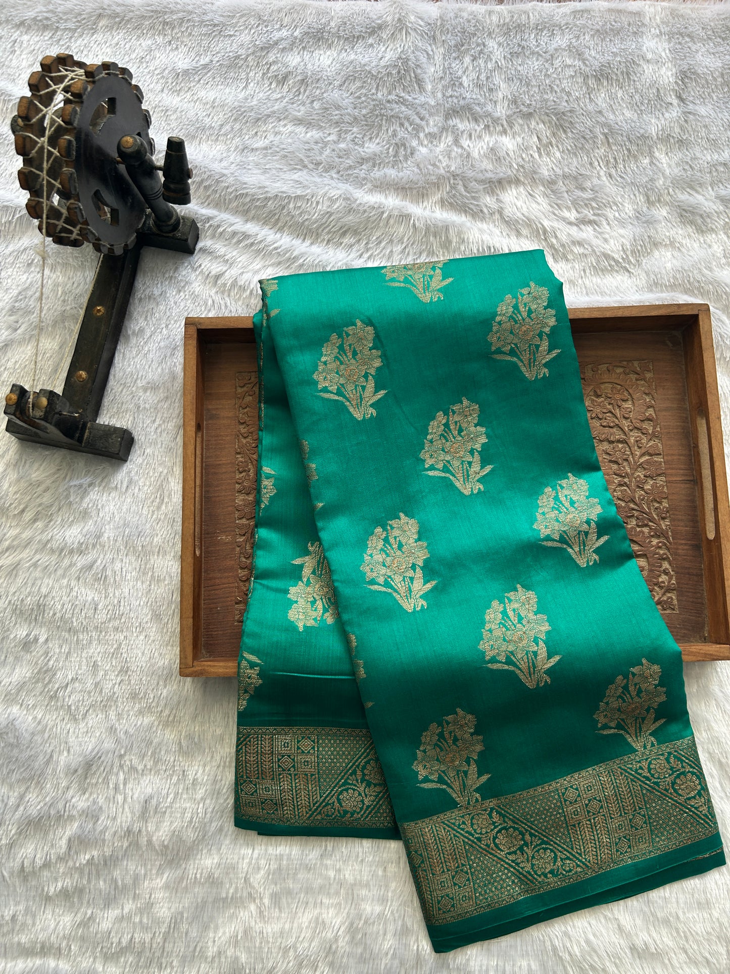 Pure Chiniya Silk Saree Rama Green Colored Elegantly Paired with a Gold Zari Border.