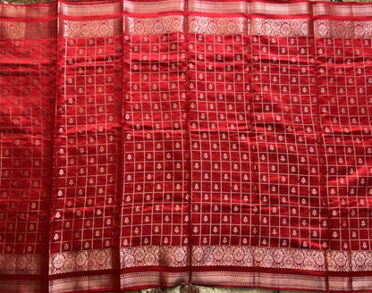 Pure Chiniya Silk Saree Red Colored Elegantly Paired with a Gold Zari Border.