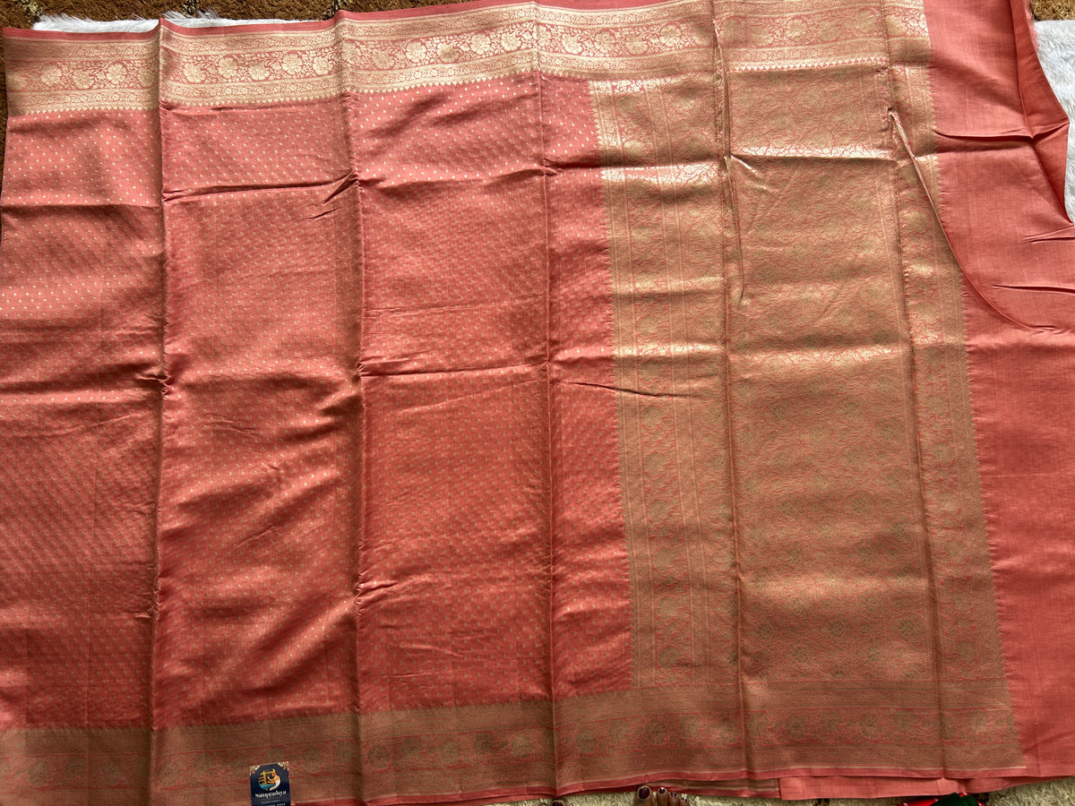 Pure Chiniya Silk Saree Onion Pink Colored Elegantly Paired with a Gold Zari Border.