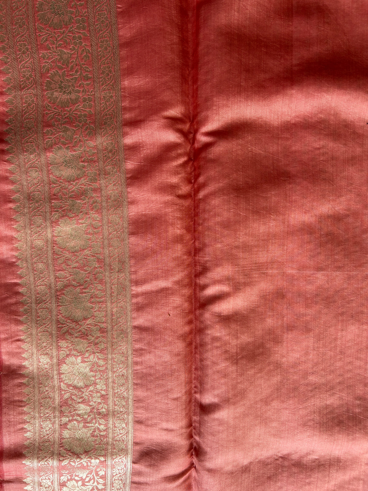 Pure Chiniya Silk Saree Onion Pink Colored Elegantly Paired with a Gold Zari Border.