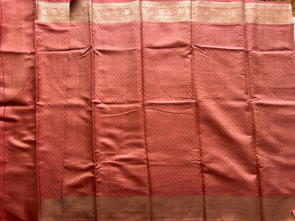 Pure Chiniya Silk Saree Onion Pink Colored Elegantly Paired with a Gold Zari Border.