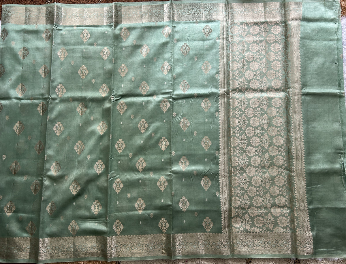 Pure Chiniya Silk Saree Sea Green Colored Elegantly Paired with a Gold Zari Border.