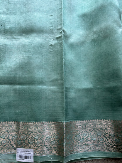 Pure Chiniya Silk Saree Sea Green Colored Elegantly Paired with a Gold Zari Border.