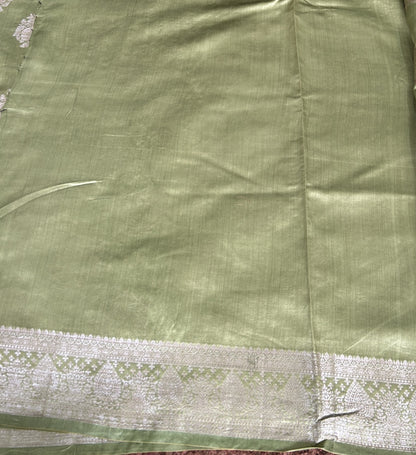 Pure Chiniya Silk Saree Mint Light Green Colored Elegantly Paired with a Gold Zari Border.