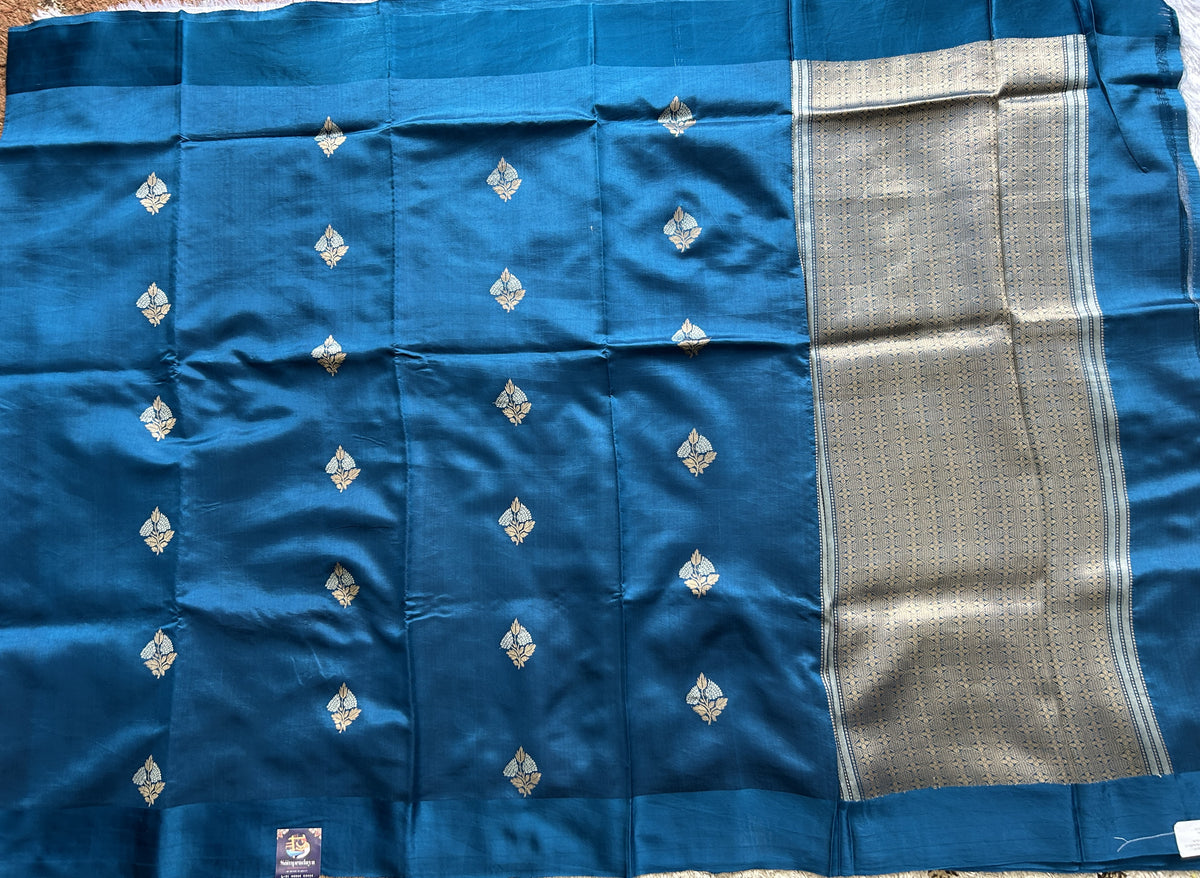 Pure Chiniya Silk Saree Mint Light Blue Colored Elegantly Paired with a Gold Zari Border.