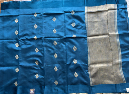 Pure Chiniya Silk Saree Mint Light Blue Colored Elegantly Paired with a Gold Zari Border.