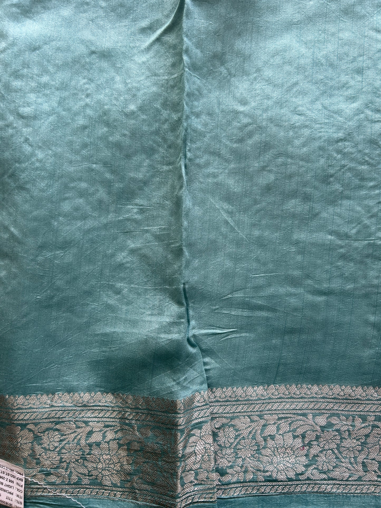 Pure Chiniya Silk Saree Ice Blue Colored Elegantly Paired with a Gold Zari Border. Purple