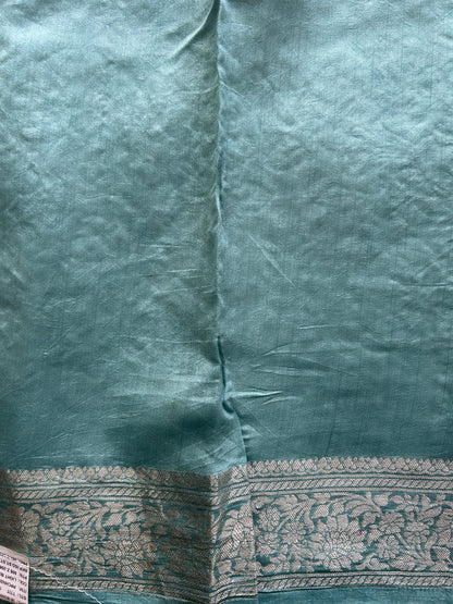Pure Chiniya Silk Saree Ice Blue Colored Elegantly Paired with a Gold Zari Border. Purple