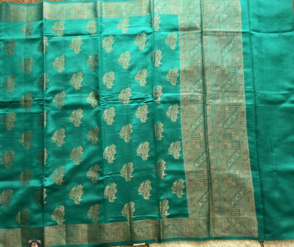 Pure Chiniya Silk Saree Rama Green Colored Elegantly Paired with a Gold Zari Border.