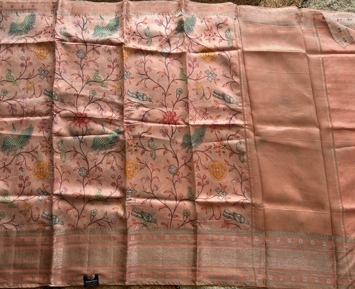 Pure Chiniya Silk Saree Peach Colored Elegantly Paired with a Gold Zari Border. Purple