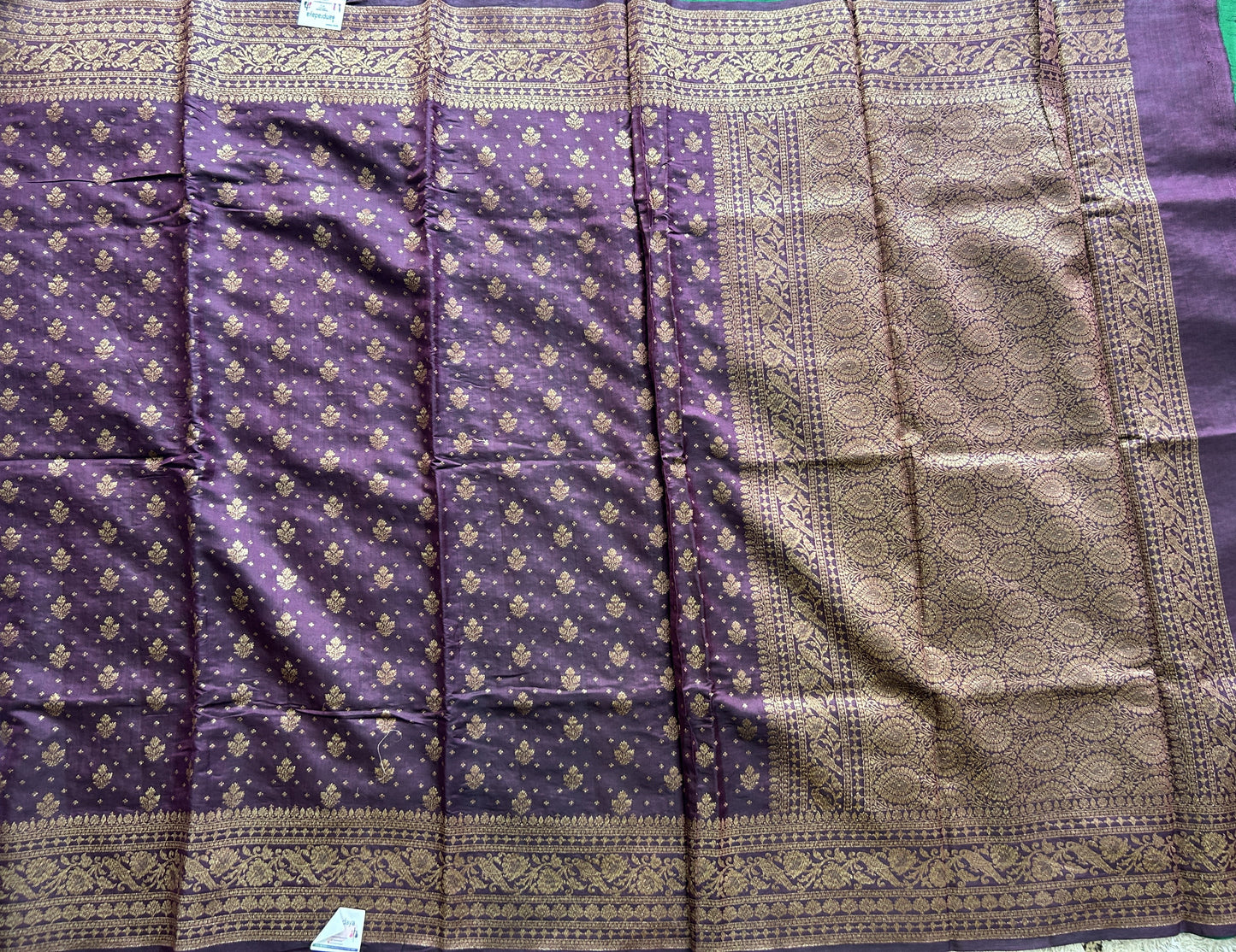 Pure Chiniya Silk Saree Wine Colored Elegantly Paired with a Gold Zari Border. Purple