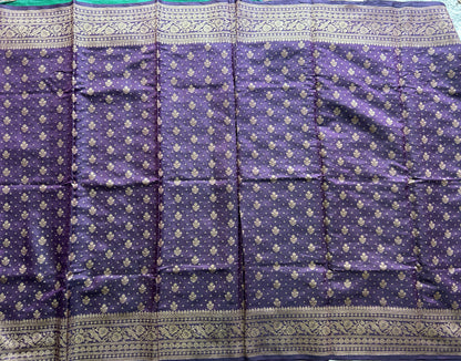 Pure Chiniya Silk Saree Wine Colored Elegantly Paired with a Gold Zari Border. Purple