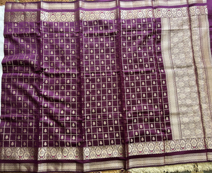 Pure Chiniya Silk Saree Violet Colored Elegantly Paired with a Gold Zari Border.
