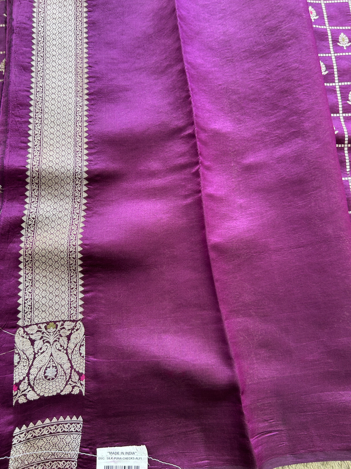 Pure Chiniya Silk Saree Violet Colored Elegantly Paired with a Gold Zari Border.