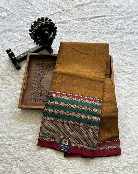 Narayanpet Cotton Saree Copper Colored Complemented with a Double Thread Border. - Sampradaya Designer Studio