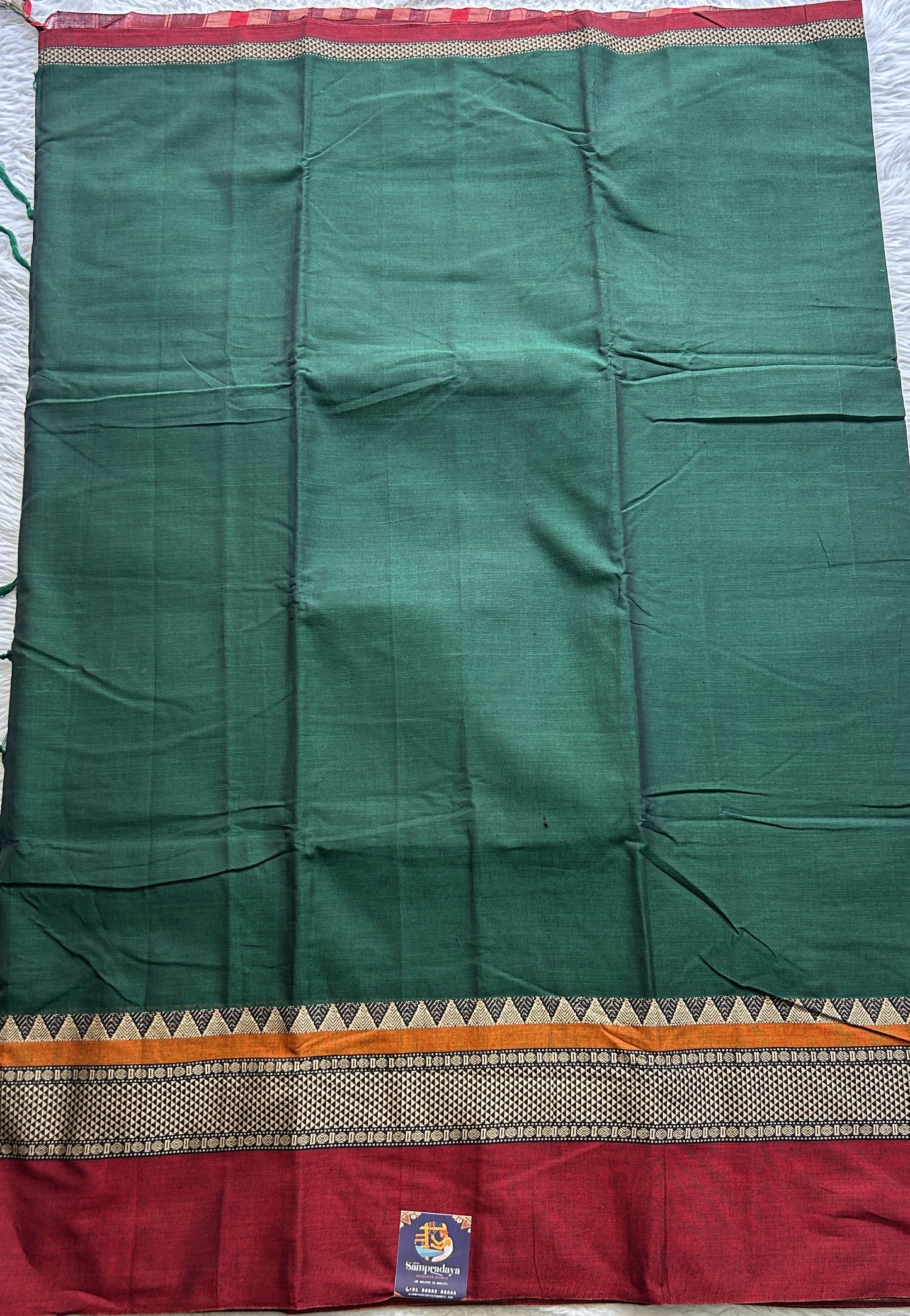 Narayanpet Cotton Saree Dark Green Colored Complemented with a Double Border. - Sampradaya Designer Studio