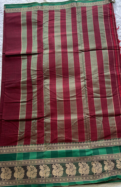 Narayanpet Cotton Saree Maroon Colored Complemented with a Peacock Border. - Sampradaya Designer Studio
