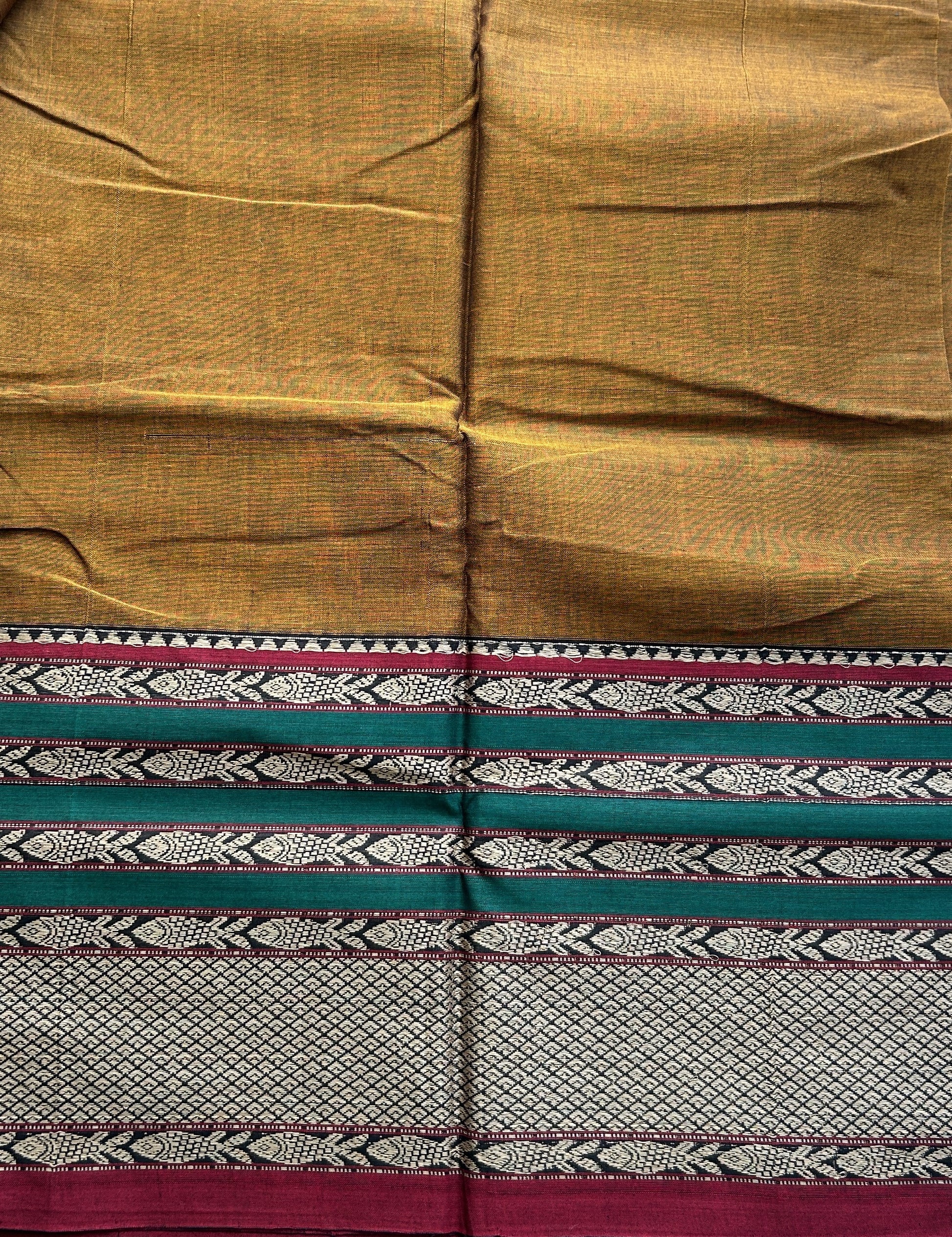 Narayanpet Cotton Saree Copper Colored Complemented with a Double Thread Border. - Sampradaya Designer Studio