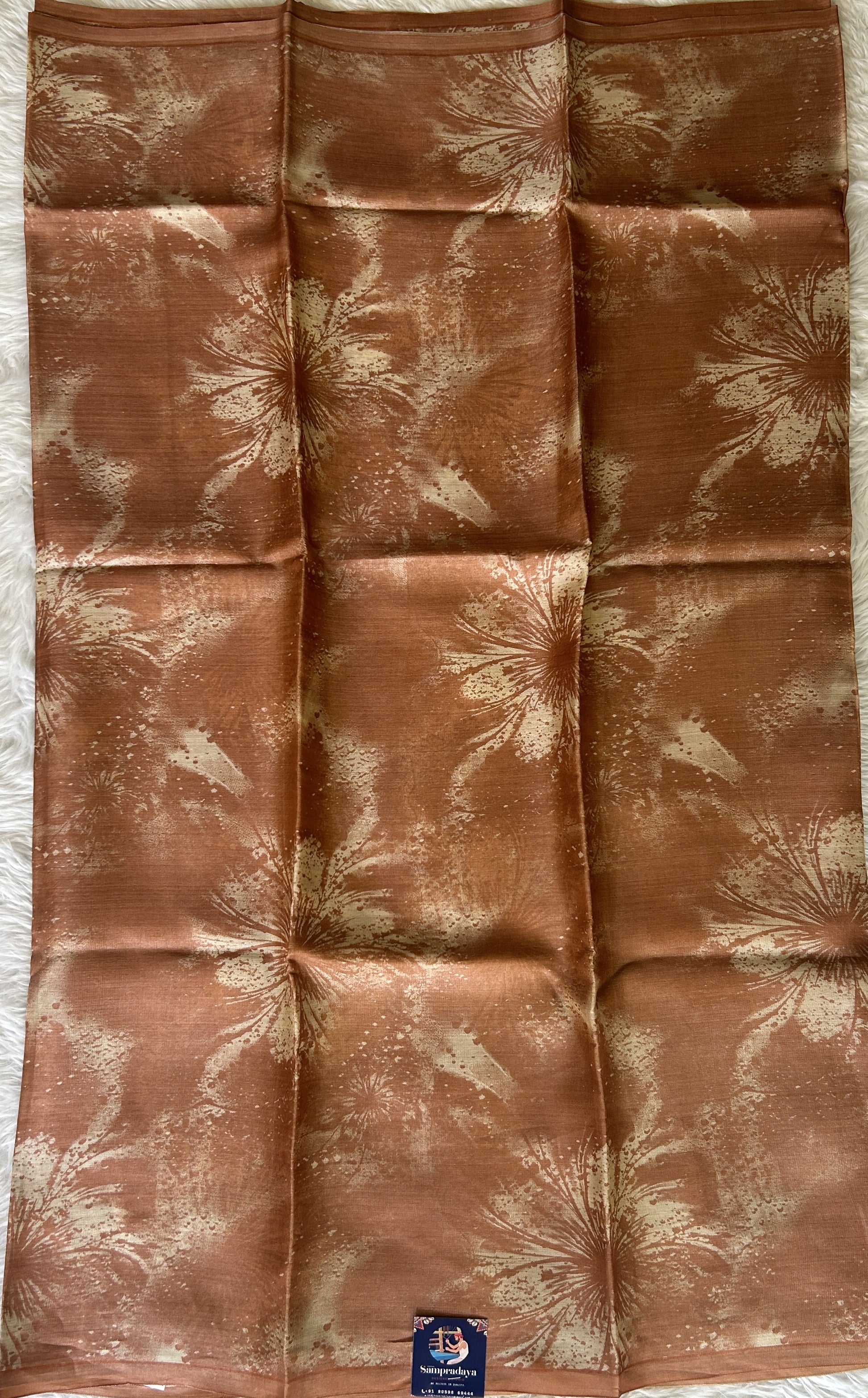 Banarasi Crepe silk Saree Rust colored complemented with a borderless. - Sampradaya Designer Studio