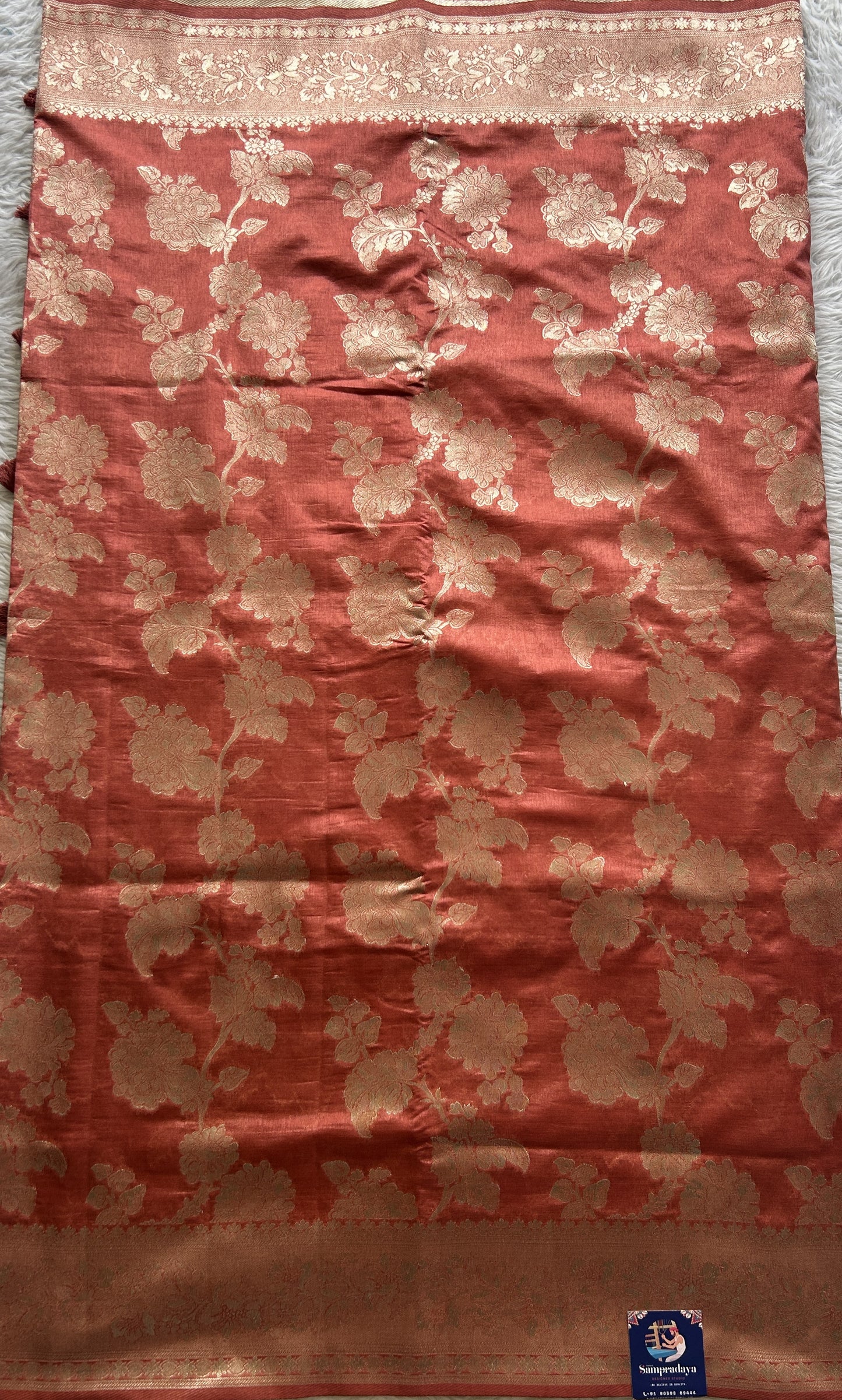 Semi Raw Silk Saree Dark Peach Colored Complemented with a Zari Border. - Sampradaya Designer Studio
