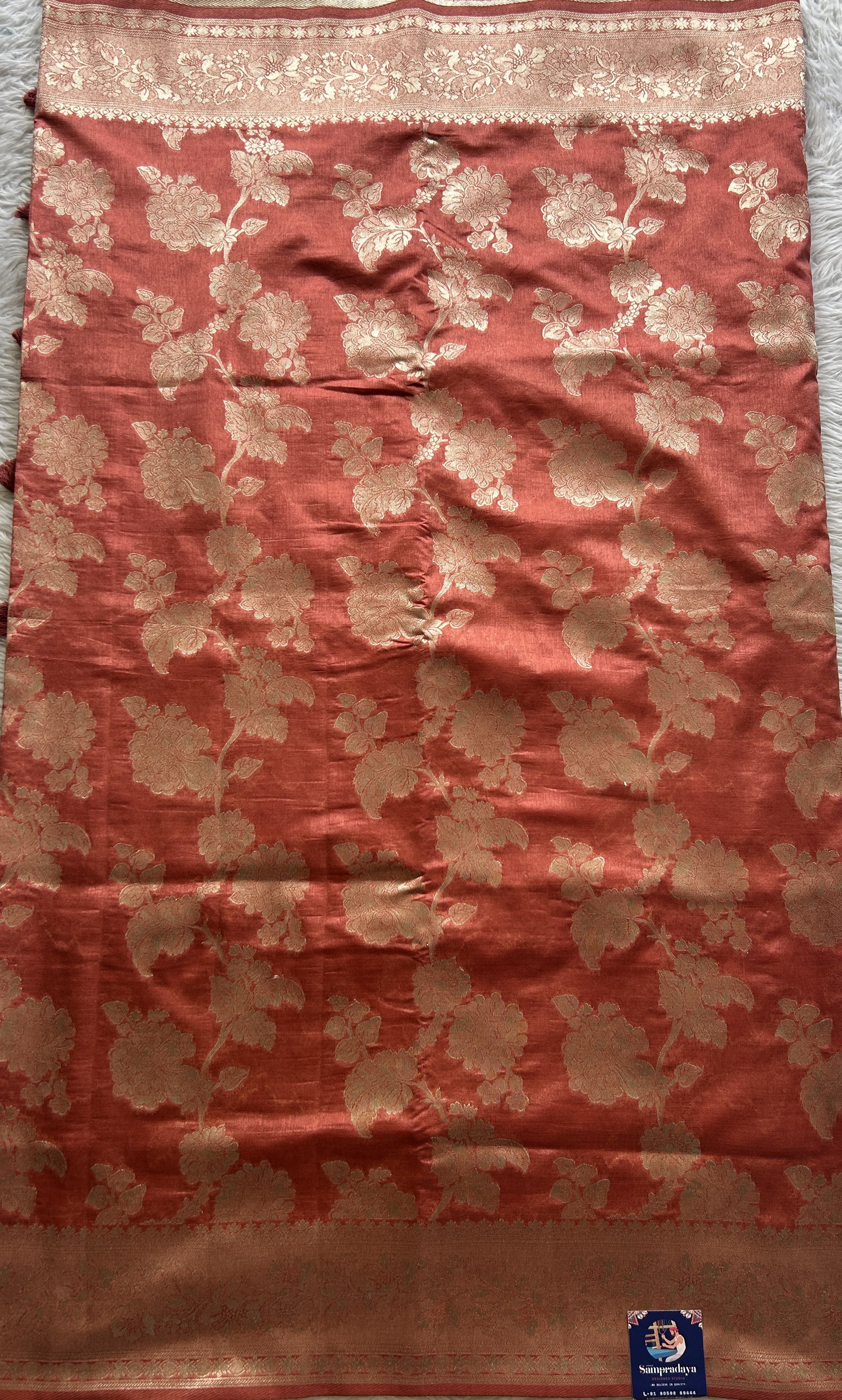 Semi Raw Silk Saree Dark Peach Colored Complemented with a Zari Border. - Sampradaya Designer Studio
