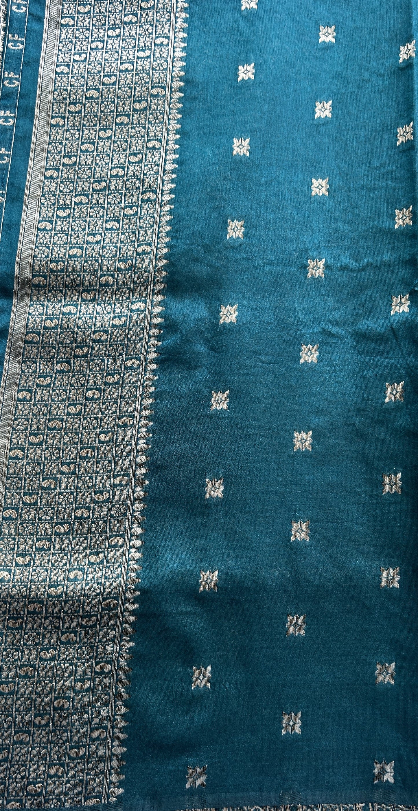Semi Raw Silk Allover Saree Sea Green Colored Complemented with a Zari Border. - Sampradaya Designer Studio