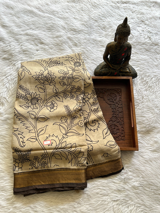 Pen Kalamkari Saree Beige colored complemented with a Brown Colored Zari border - Sampradaya Designer Studio