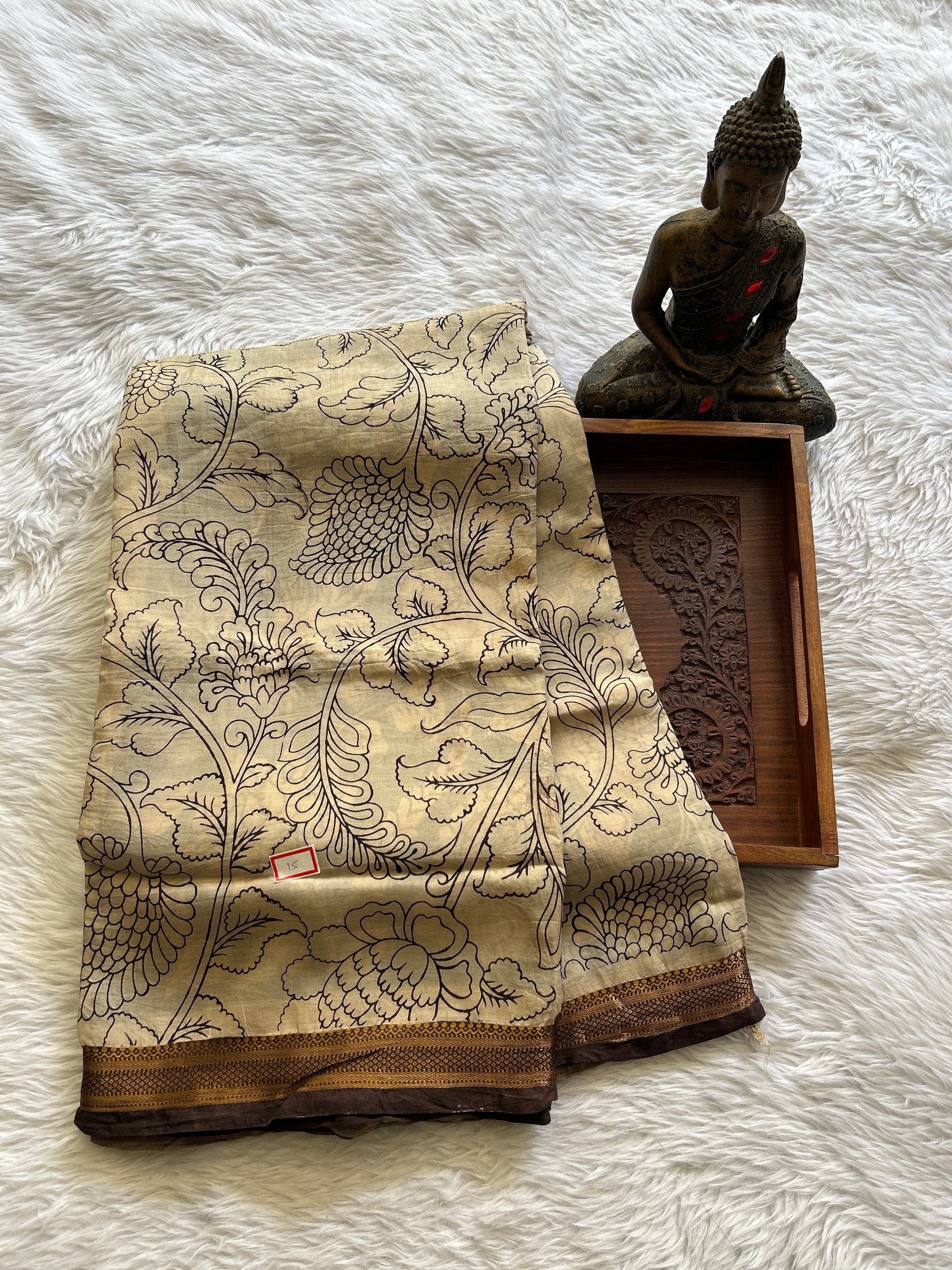 Pen Kalamkari Saree Beige colored complemented with a Brown Colored Gold Zari border - Sampradaya Designer Studio