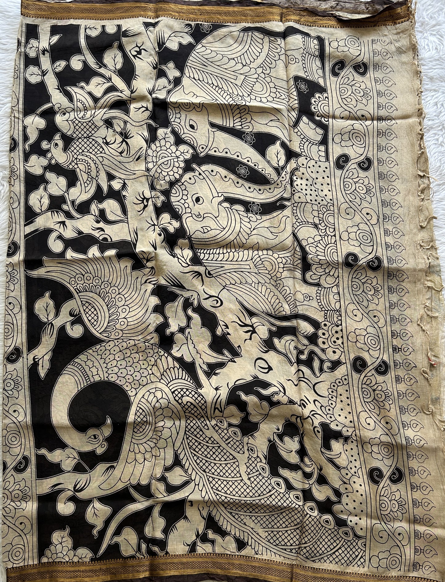 Pen Kalamkari Saree Beige colored complemented with a Brown Colored Gold Zari border - Sampradaya Designer Studio