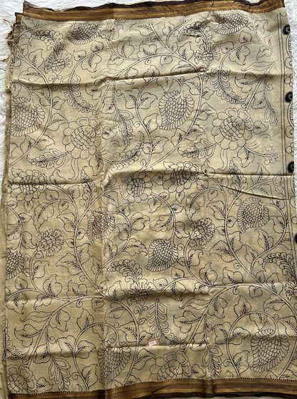 Pen Kalamkari Saree Beige colored complemented with a Brown Colored Gold Zari border - Sampradaya Designer Studio