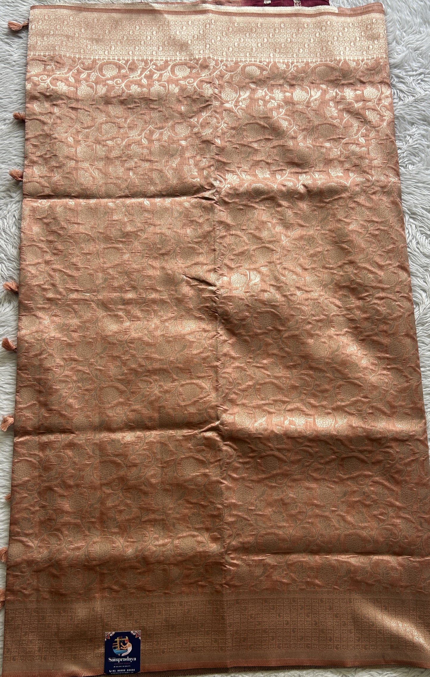 Semi Raw Silk Allover Saree Dusty Peach Colored Complemented with a Zari Border. - Sampradaya Designer Studio