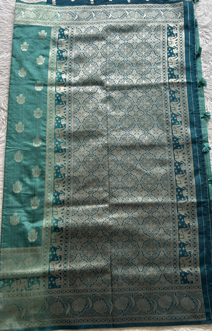 Semi Raw Silk Allover Saree Deep Dusty Blue Colored Complemented with a Zari Border. - Sampradaya Designer Studio
