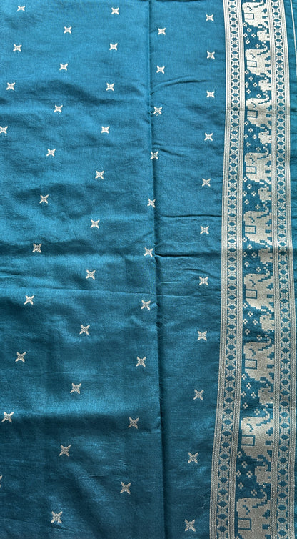Semi Raw Silk Allover Saree Deep Dusty Blue Colored Complemented with a Zari Border. - Sampradaya Designer Studio