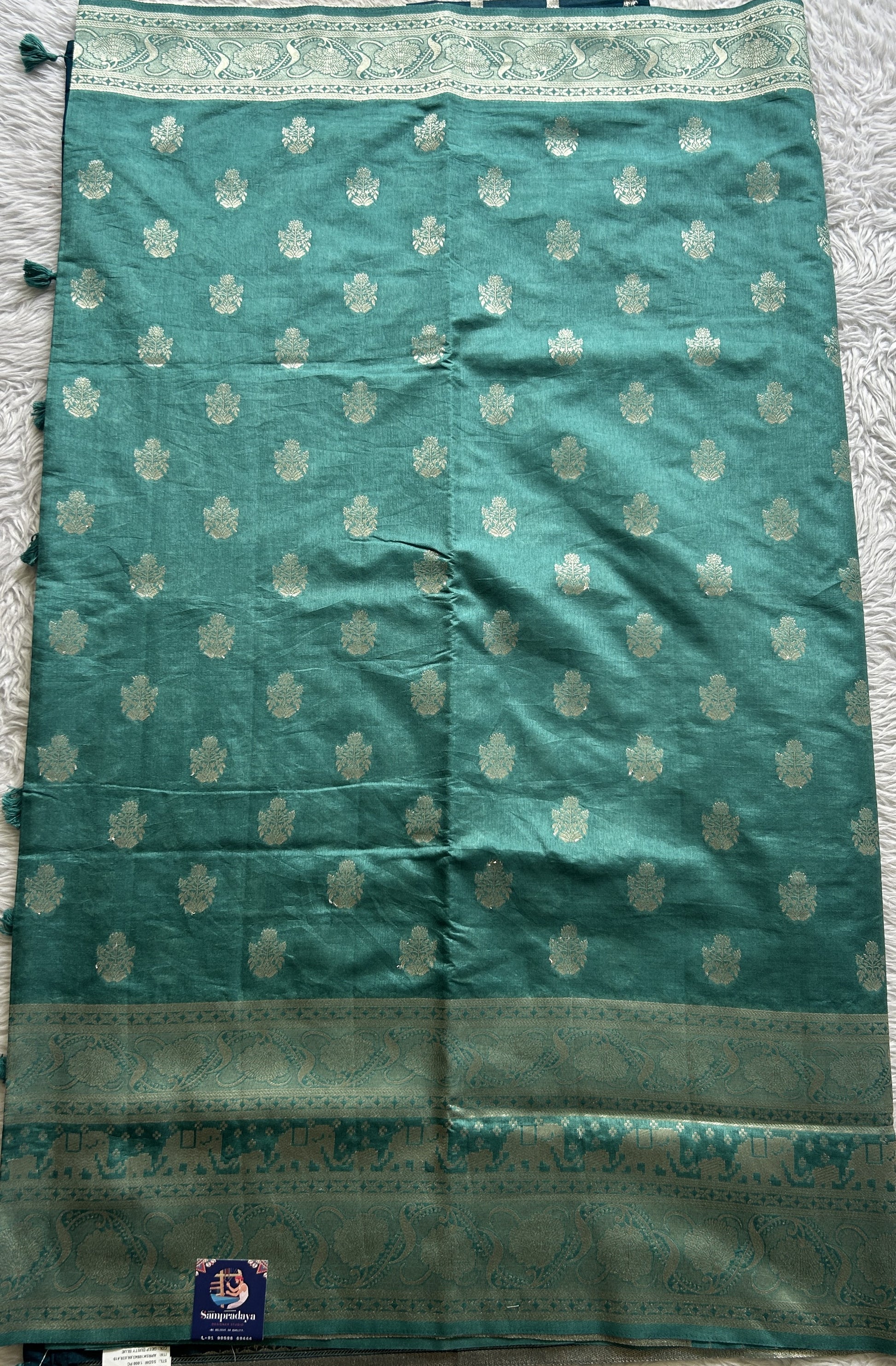 Semi Raw Silk Allover Saree Deep Dusty Blue Colored Complemented with a Zari Border. - Sampradaya Designer Studio