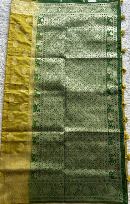 Semi Raw Silk Saree Fluorescent Green Colored Complemented with a Zari Border. - Sampradaya Designer Studio
