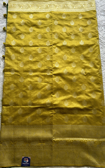 Semi Raw Silk Saree Fluorescent Green Colored Complemented with a Zari Border. - Sampradaya Designer Studio