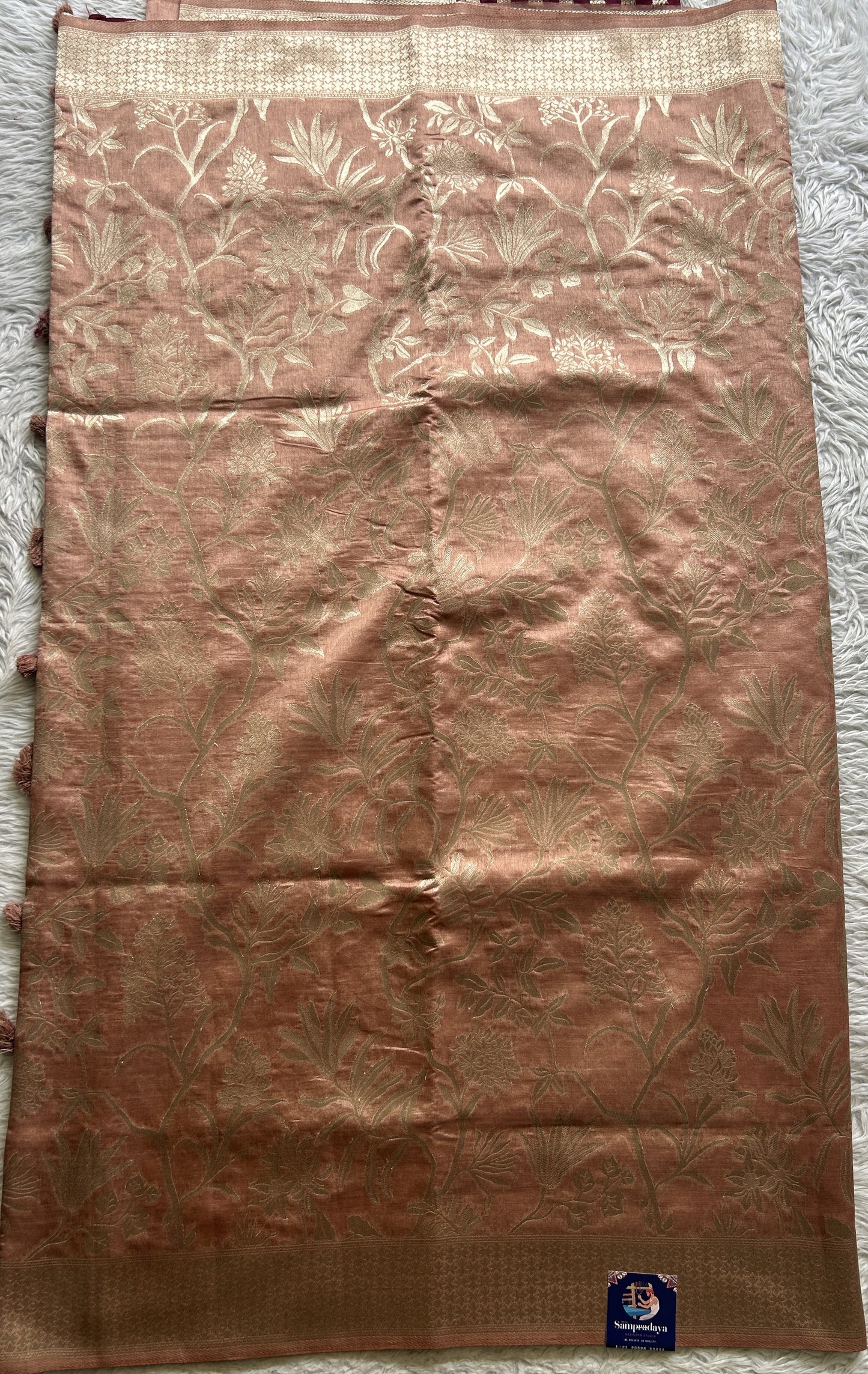 Semi Raw Silk Saree Dusty Peach Colored Complemented with a Zari Border. - Sampradaya Designer Studio