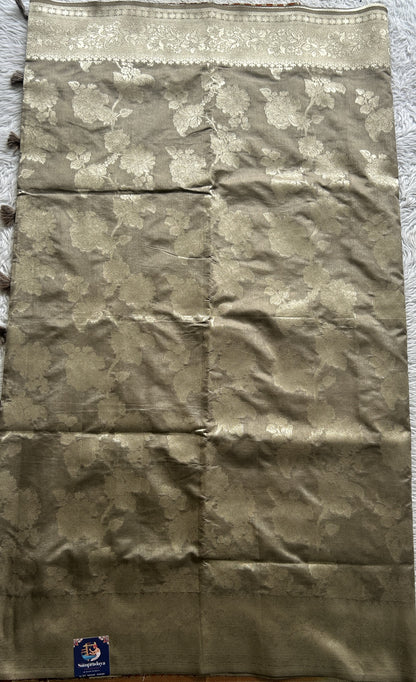 Semi Raw Silk Allover Saree Cement Colored Complemented with a Zari Border. - Sampradaya Designer Studio