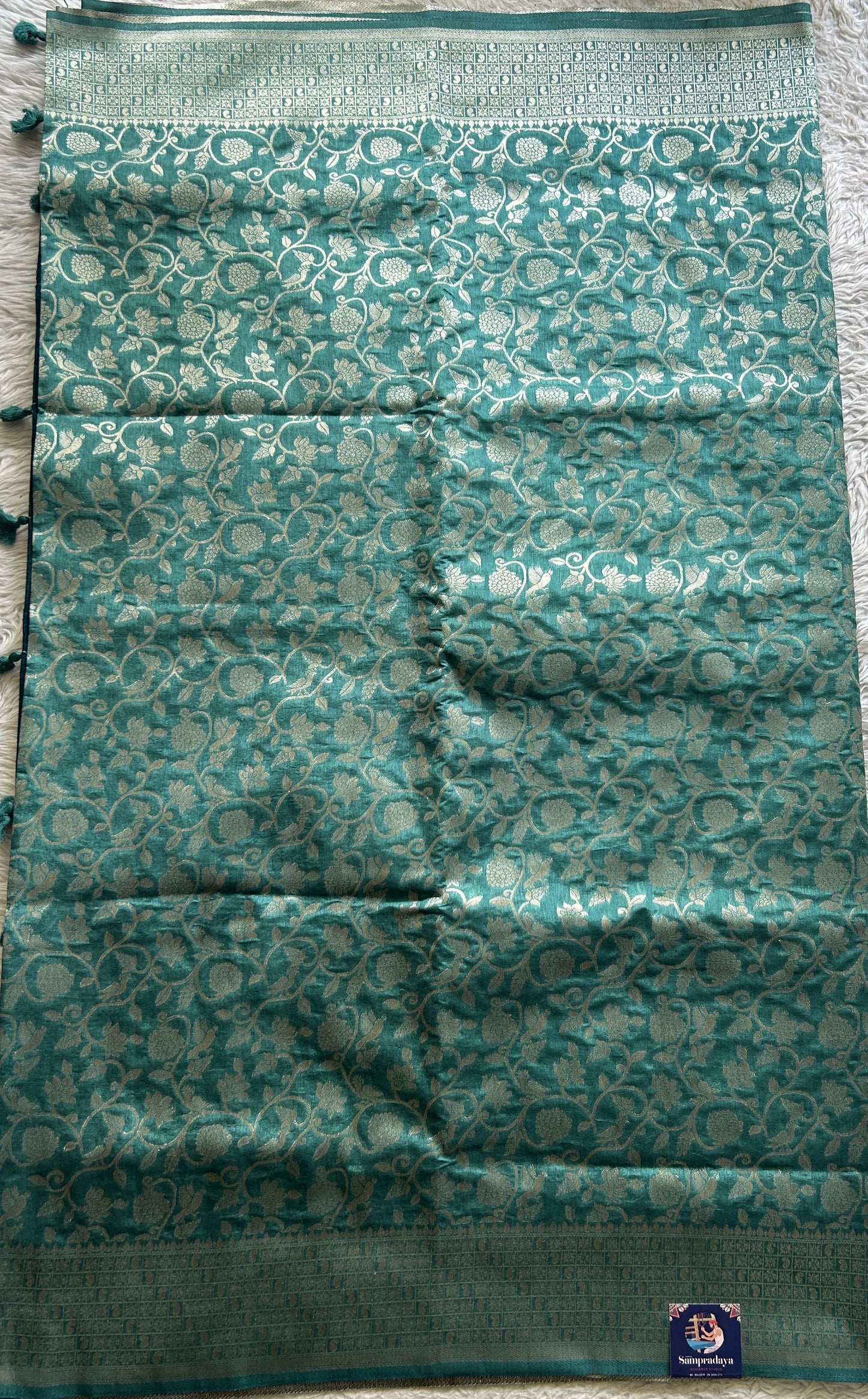 Semi Raw Silk Allover Saree Sapphire Colored Complemented with a Zari Border. - Sampradaya Designer Studio
