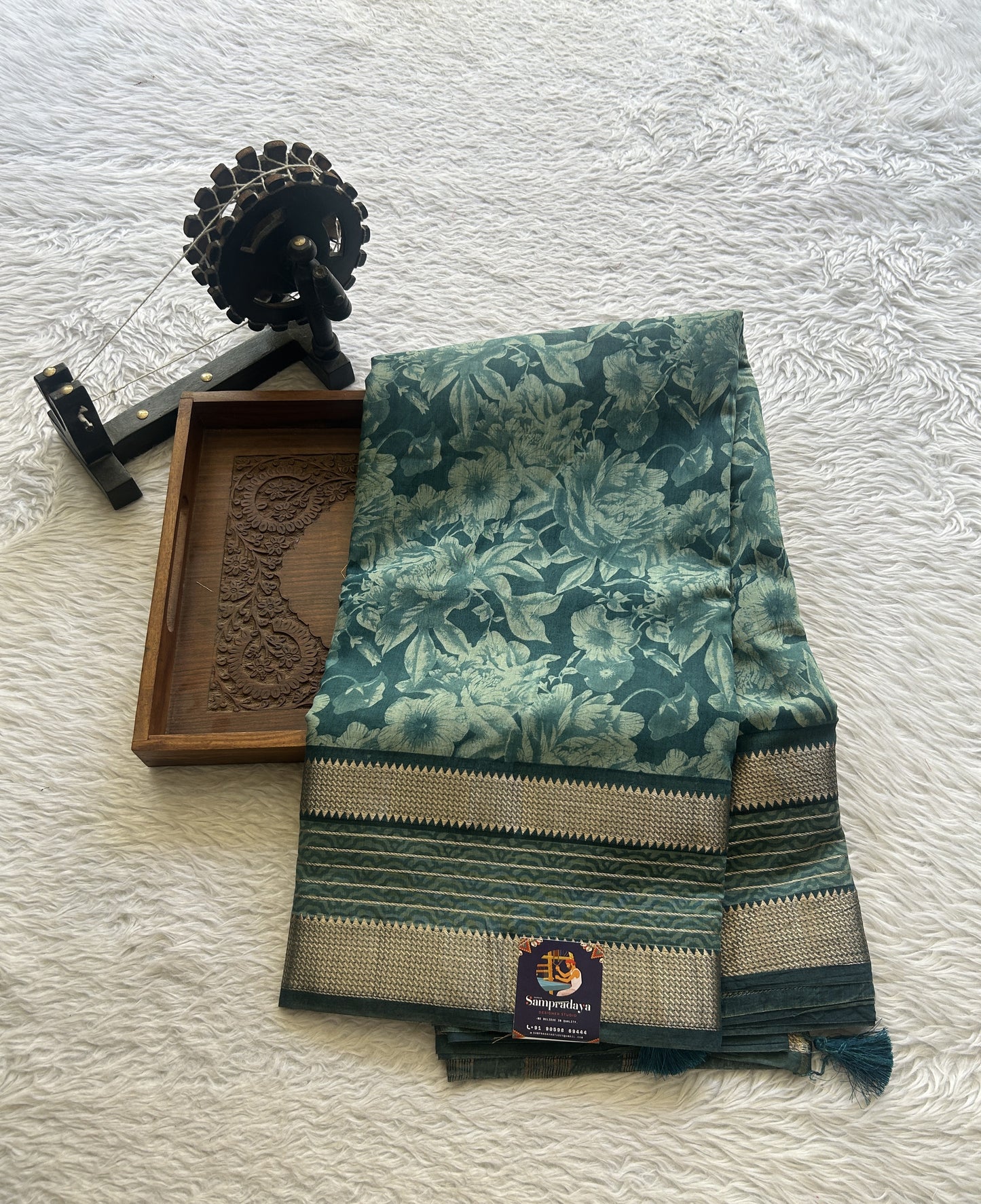Dola Crepe Saree Teal Colored Complemented with a Zari Border. - Sampradaya Designer Studio