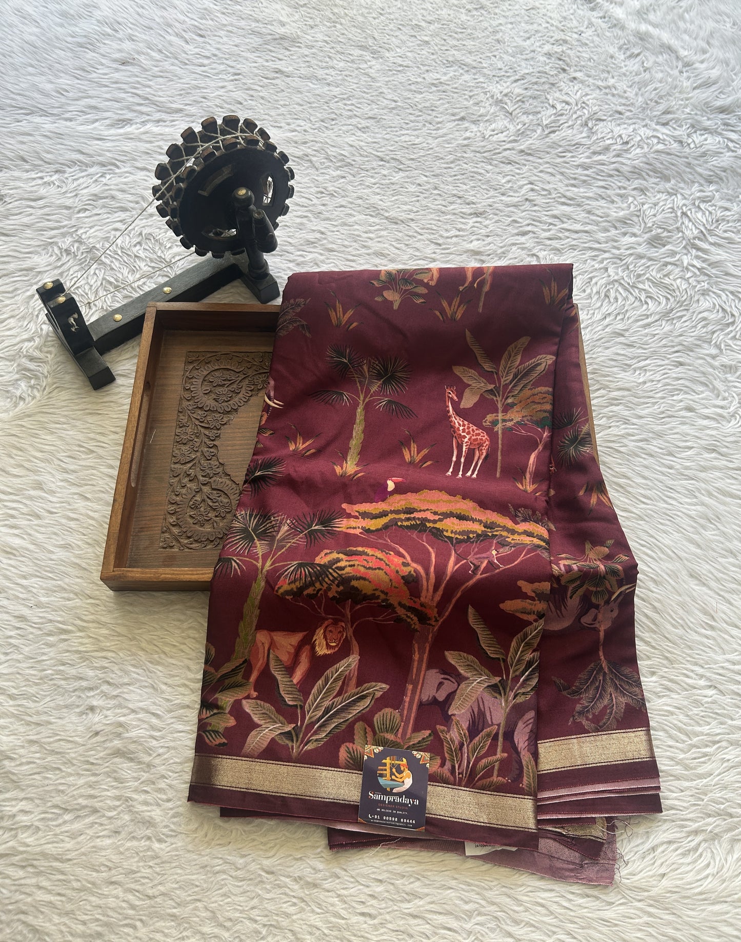 Dola Crepe Saree Wine Colored Complemented with a Zari Border. - Sampradaya Designer Studio
