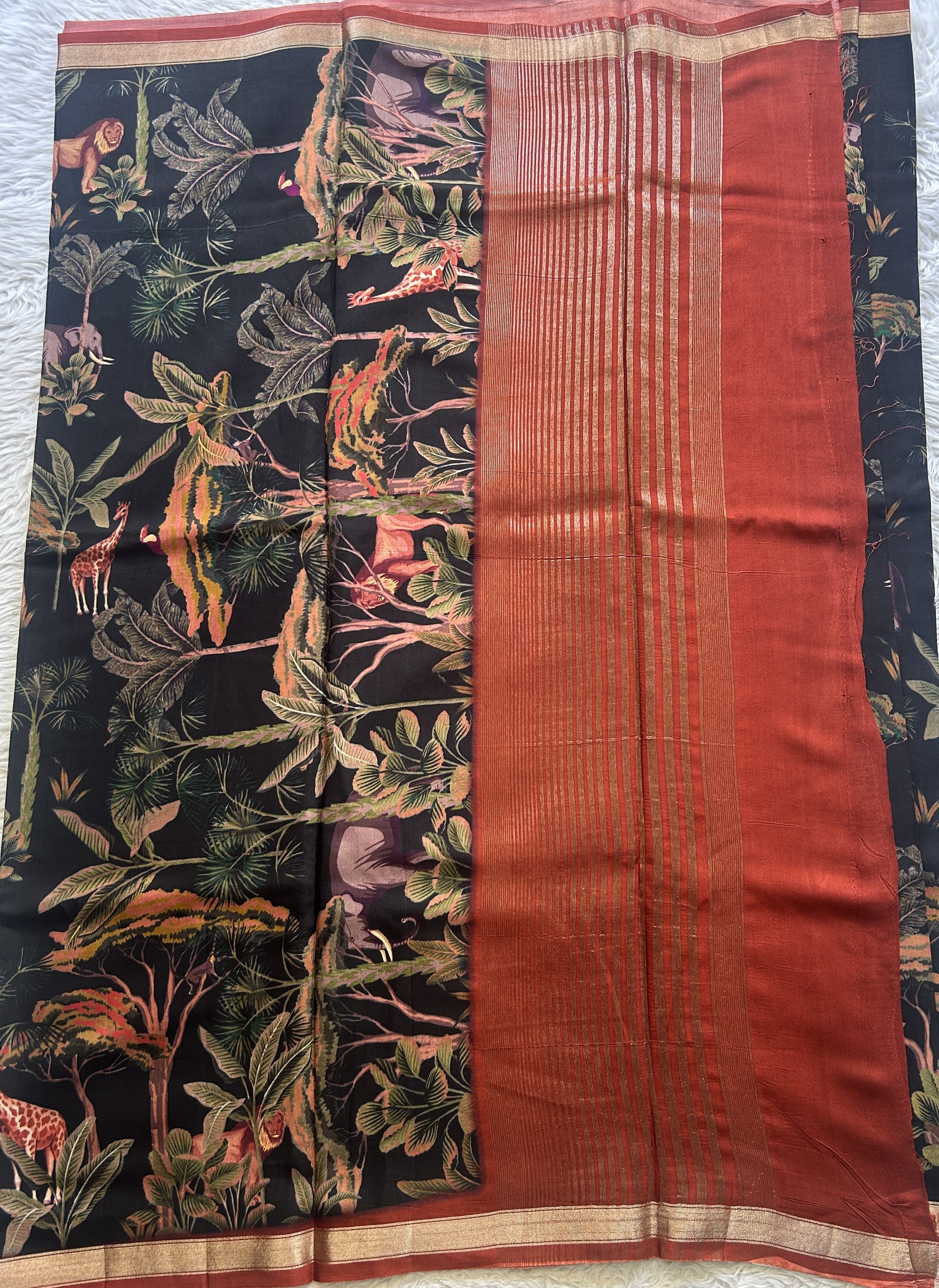 Dola Crepe Saree Charcoal Colored Complemented with a Zari Border. - Sampradaya Designer Studio