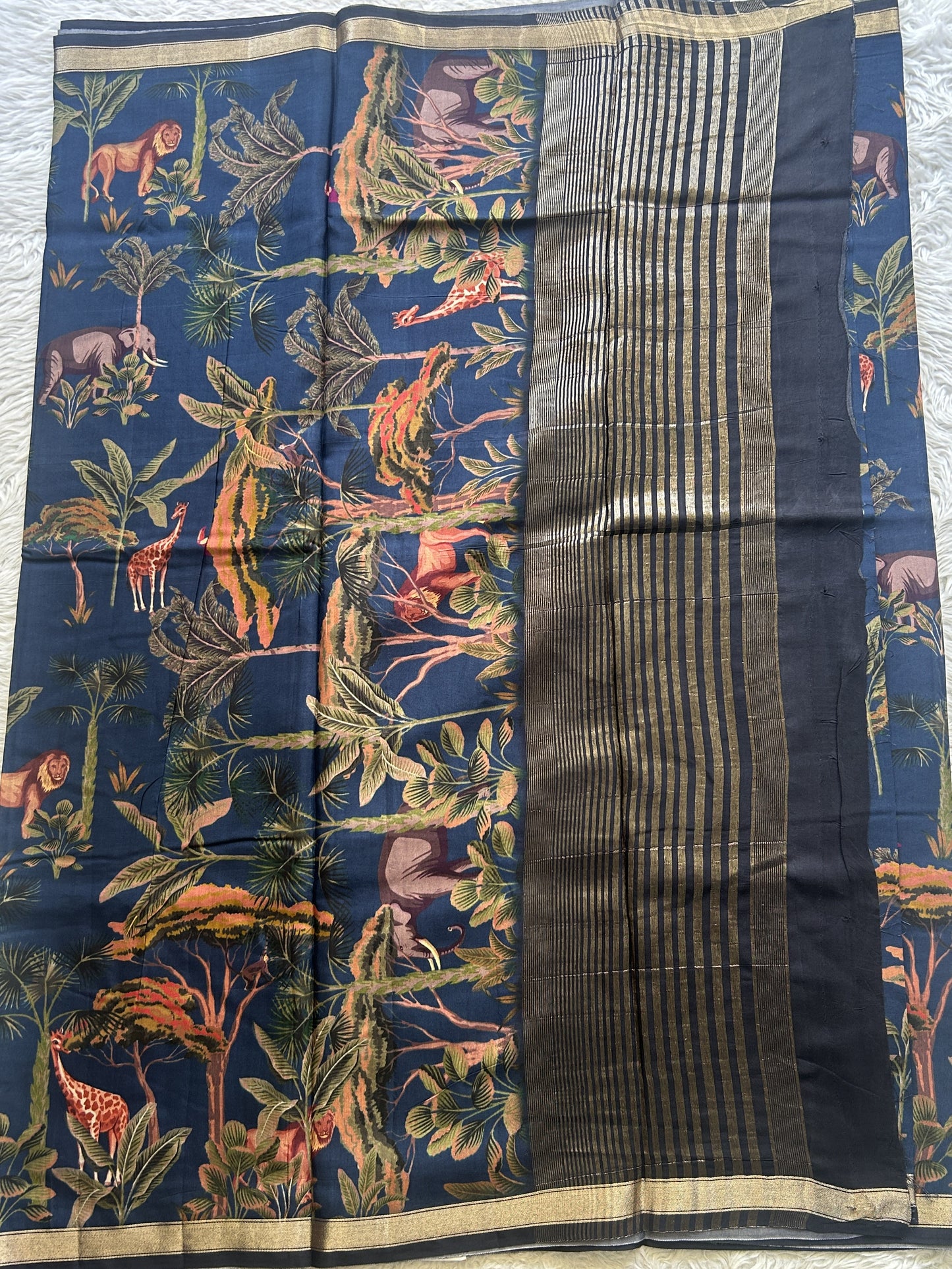 Dola Crepe Saree Navy Blue Colored Complemented with a Zari Border. - Sampradaya Designer Studio