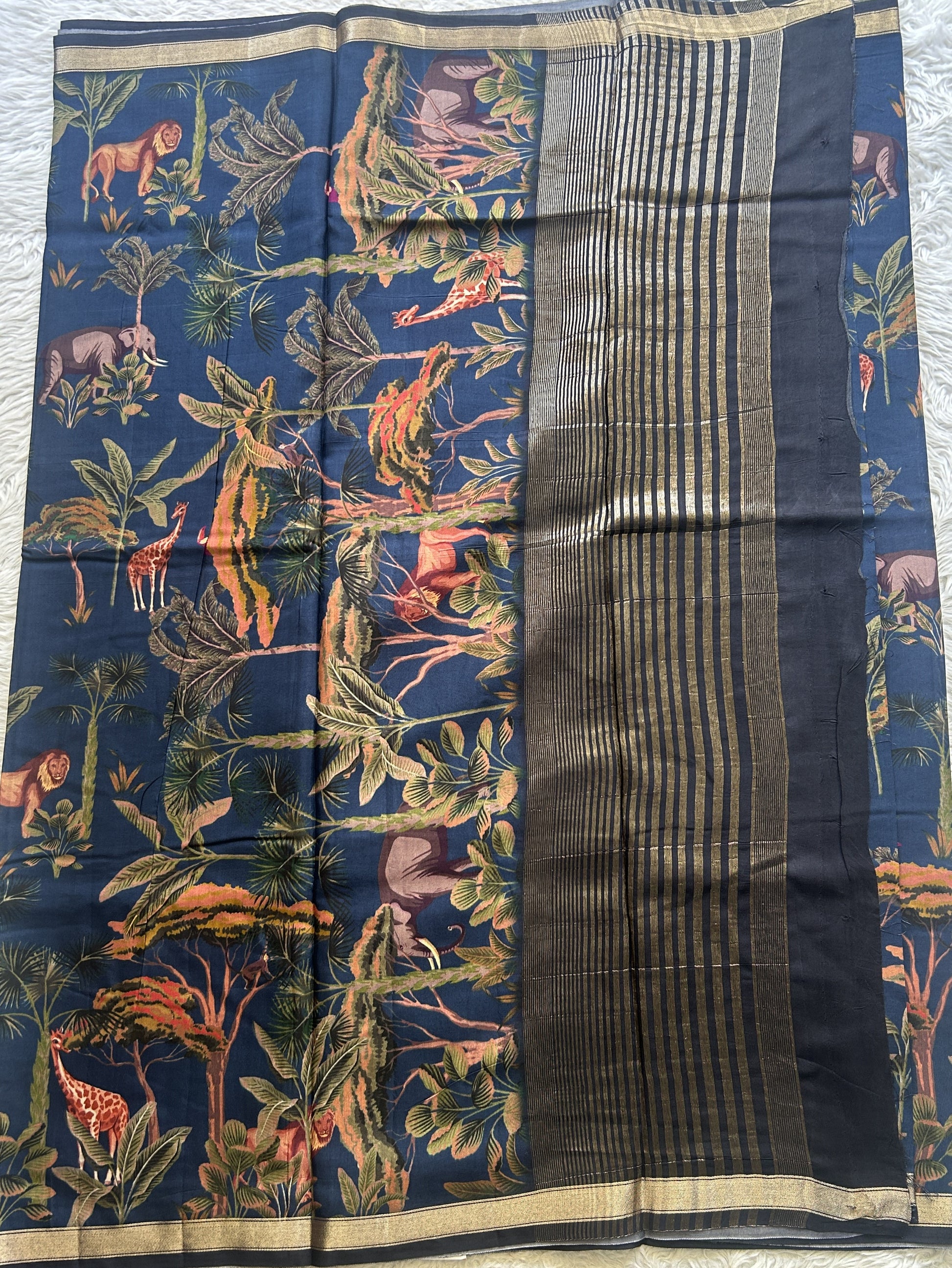 Dola Crepe Saree Navy Blue Colored Complemented with a Zari Border. - Sampradaya Designer Studio