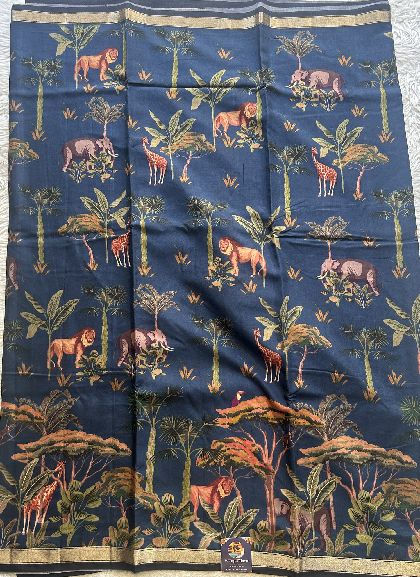 Dola Crepe Saree Navy Blue Colored Complemented with a Zari Border. - Sampradaya Designer Studio