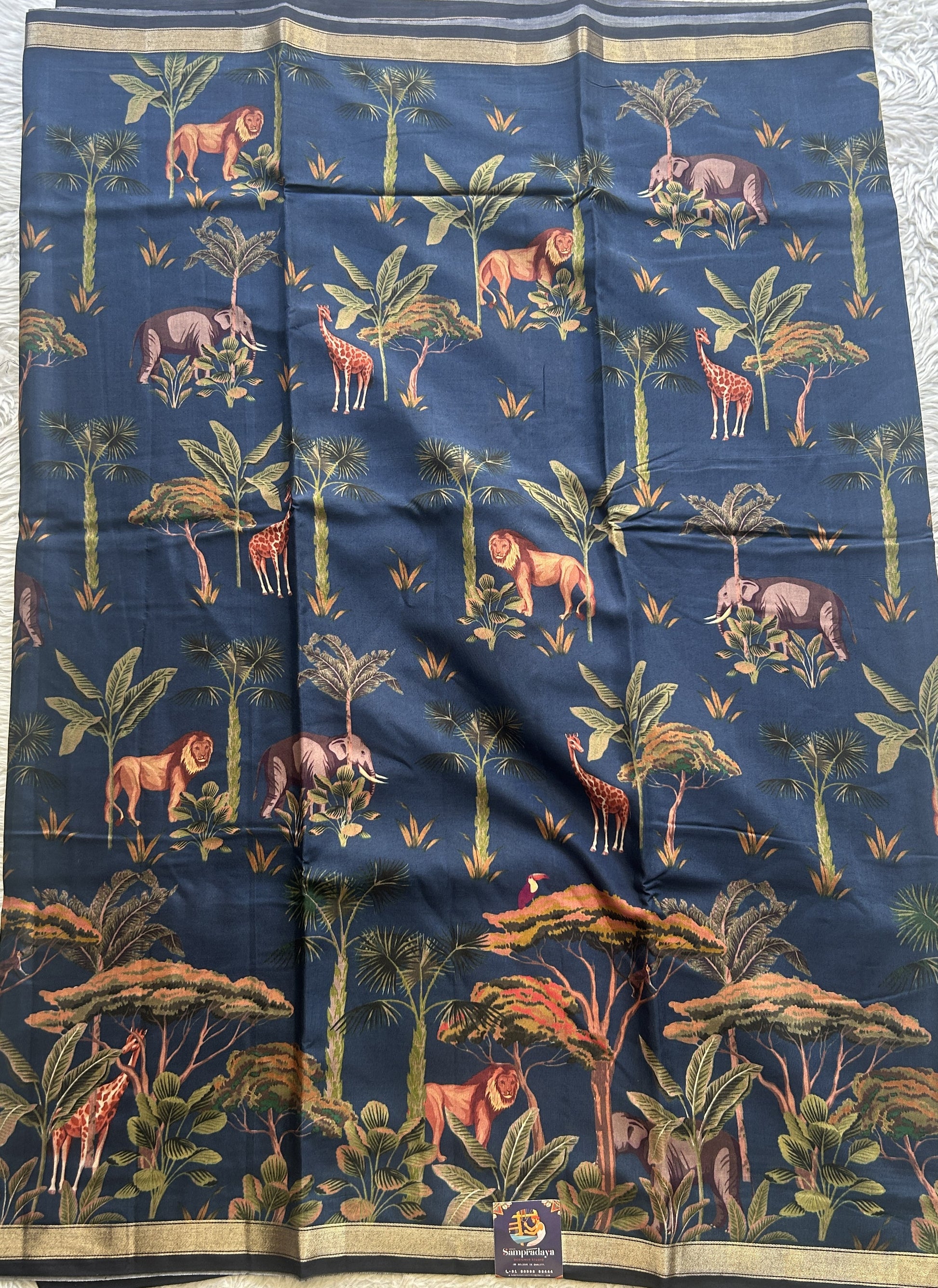 Dola Crepe Saree Navy Blue Colored Complemented with a Zari Border. - Sampradaya Designer Studio