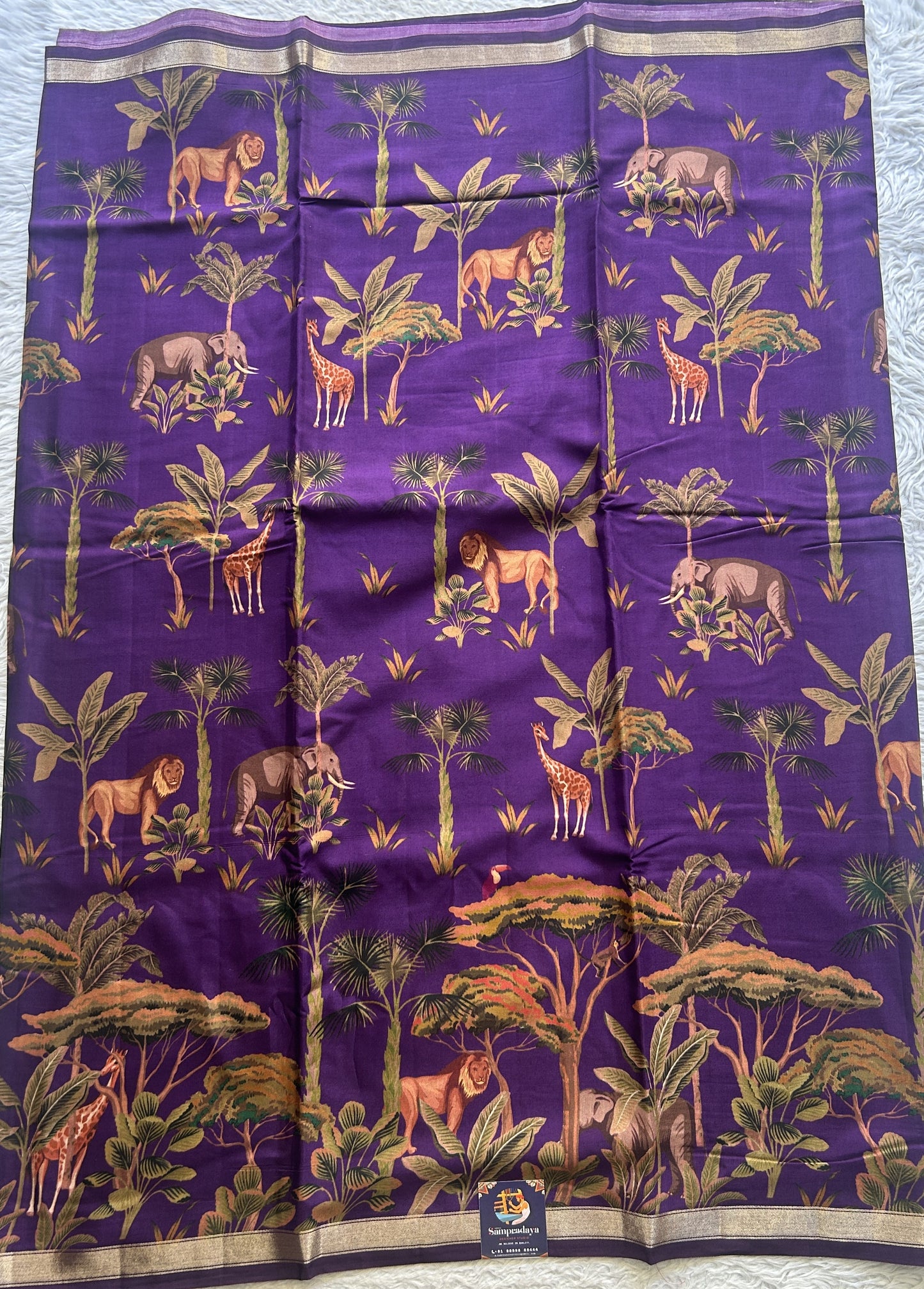 Dola Crepe Saree Violet Colored Complemented with a Zari Border. - Sampradaya Designer Studio