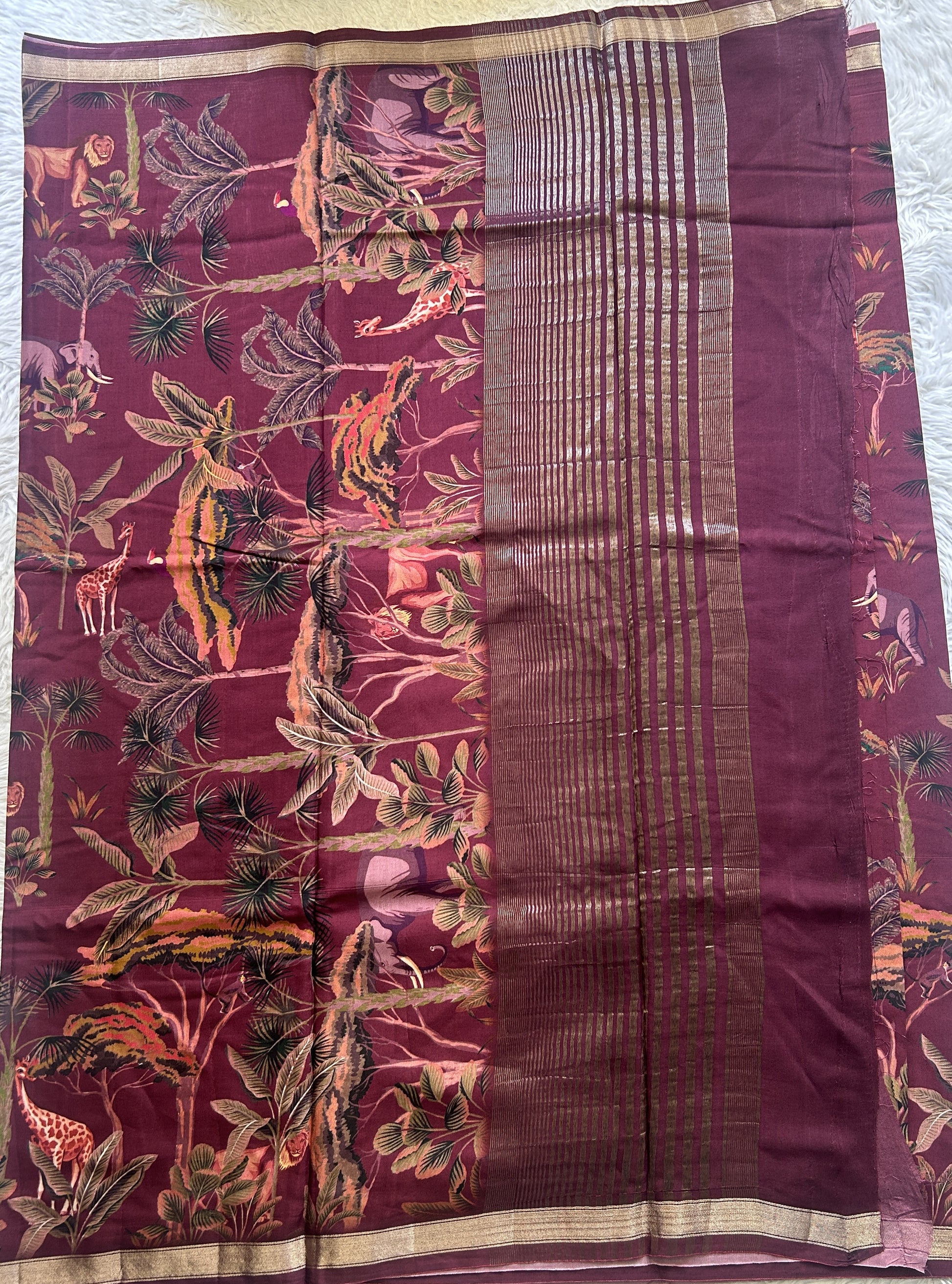 Dola Crepe Saree Wine Colored Complemented with a Zari Border. - Sampradaya Designer Studio