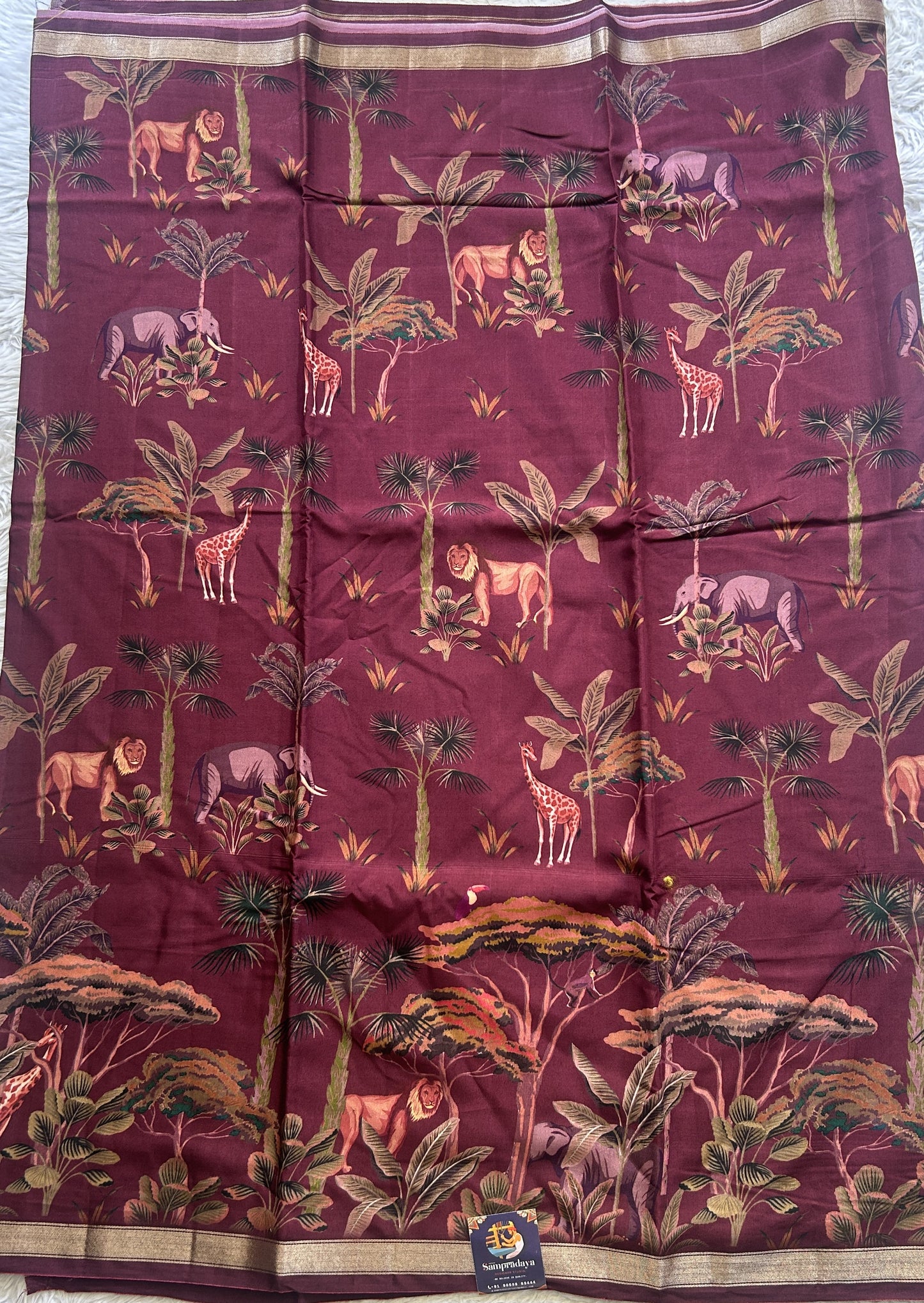 Dola Crepe Saree Wine Colored Complemented with a Zari Border. - Sampradaya Designer Studio