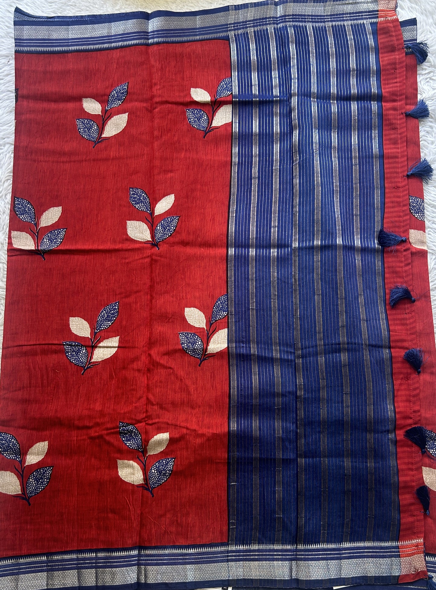 Dola Crepe Saree Red Colored Complemented with a Ink Blue Zari Border. - Sampradaya Designer Studio